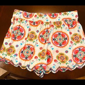 Khaki shorts size 6 and stretch colorful size medium. Both sold together for $20